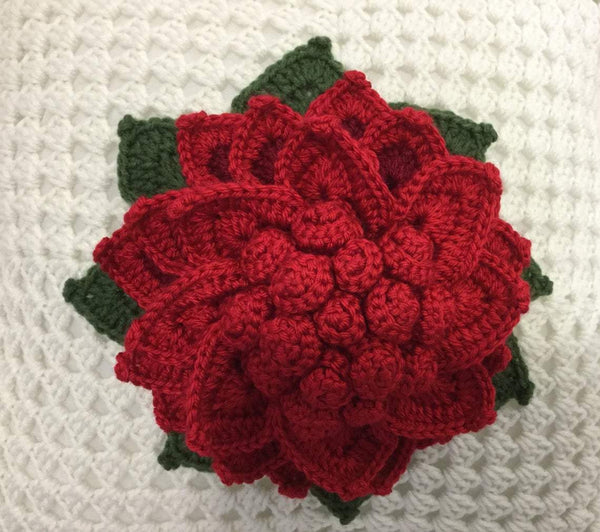 White crochet cushion with blooming flower, 18