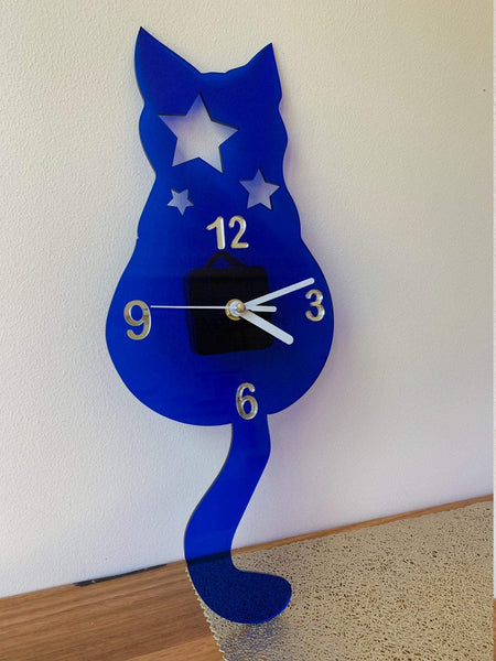 Wall clock with original design of a cat with stars blue silver numbers and white arms kids bedroom home decoration