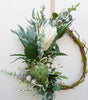 Image of Green and white wreath. Protea, thistle, eucalyptus. Australian christmas wreath, door decoration. Mossy vine wreath.